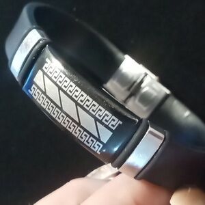 Men's soft silicone bracelet with stainless steel accents & a watch clasp